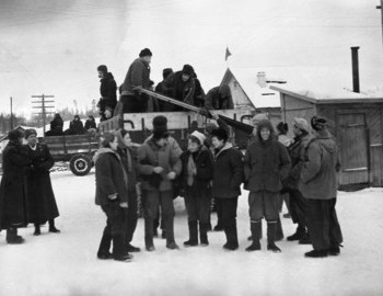 25 Jan 1959 - Vizhay, Blinov group is loading a truck. Dyatlov group is seeing them off - Kolevatov smiling to the camera
