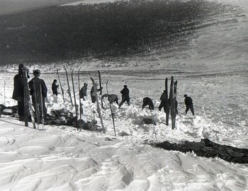 In the snow, you can see the rings removed from the ski poles, which were used for searching.