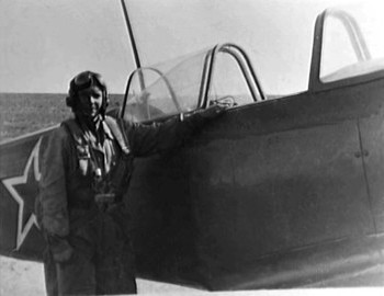 Gennadiy Vasilyevich Patrushev with a Yak 9 fighter
