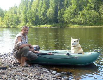 Aleksey Vasyov and dog Ural on Lozva river