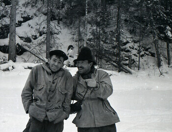Thibeaux-Brignolle and Semyon Zolotaryov swapped hats, guys are in great mood during a break on Lozva river on 28 Jan 1959