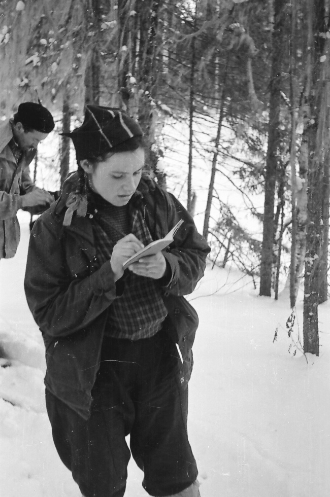 Zina Kolmogorova keeps a diary during a hike.