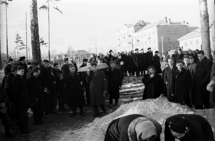 Relatives of Yuri Doroshenko follow the coffin