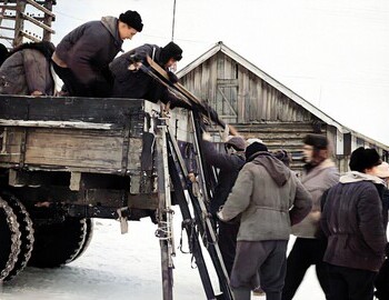 Blinov's group loading the truck. In the truck: Blinov and Eroshev.