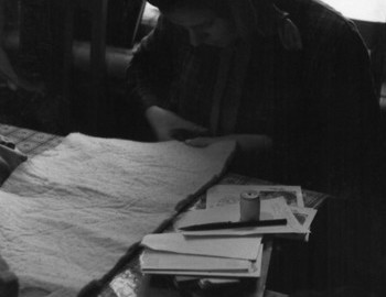 24 Jan 1959 - Serov, 41-th school, Zina is cutting sheepskin insoles with felt scissors.