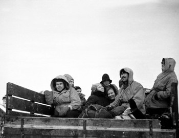 26 Jan 1959 - Vizhay, Dyatlov group is in the back of of Gaz-63. Weather is cold and windy. They will try to protect themselves with a tent, but Yudin will still get sick.