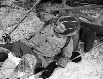 Kolya sat down on the edge of the bench, his skis drove off and he fell to the ground along with the bench. The fall made everyone laugh.