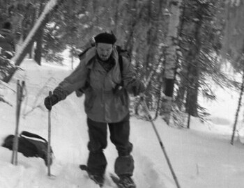 Semyon Zolotaryov, his mustache is frosted, flashlight hangs on his chest.