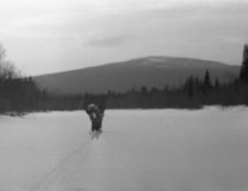 Dyatlov group on Lozva river. In the distance mountain Hoy-Ekva 733m.