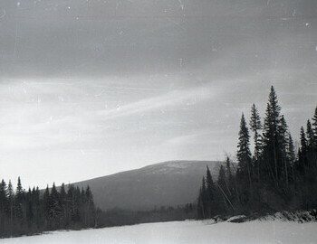 Krivonischenko is leading the group and taking the photo. In the distance mountain Hoy-Ekva 733m.
