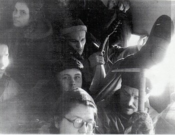 Jan 25.  In the bus to Vizhay: Doroshenko, Kolmogorova, Krivonischenko, Devyatov (with the mandolin), Svechnikova, and Zolotaryov.