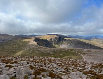 Cairn Gorm in mid summer, looking south west past the cliffs of Coire an t'Sneachda towards Cairn Toul. 