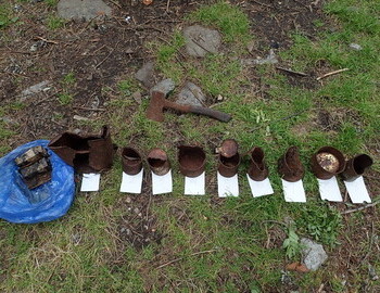 Batteries, axe and tin cans found in the area where the winter searchers camp must have been in 1959.