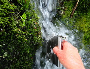 Water form the creek for an experiment - the metal flask forms a Faraday cage to limit the exposure of the water during my trip back