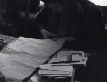 Kolmogorova sewing boot covers in the school in Serov Jan 24. Letter to her family started on the table.