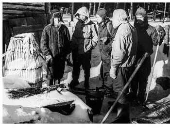 Ivan Denisov showing the Sverdlovsk students the hunting and fishing equipment
