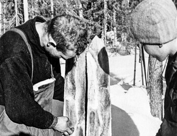 Ivan Denisov showing the Sverdlovsk students his skis