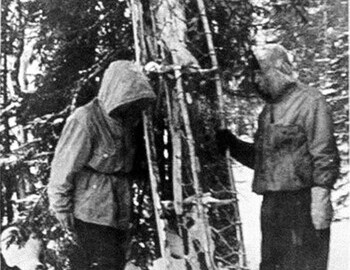 Ivan Denisov showing the Sverdlovsk students a sled