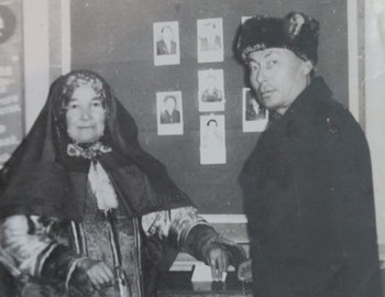 Nikolay Vasilyevich Anyamov with his sister Marfa Vasilyevna at a polling station, Ushma