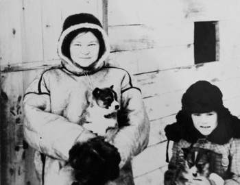 Suevat-paul. Anna Kurikova and Adin Pavel holding puppies