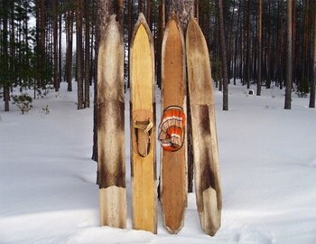 Wide Mansi skis with deer skin at the bottom for traction