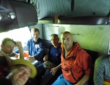On the train: Yuri Kuntsevich, Andrey Guselnikov and Graham Phillips. Photo by Dmitriy Nikolaevich