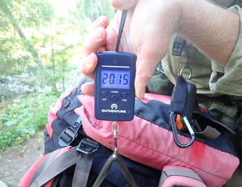 My backpack on the way back is 20 kg (44 lb). On the way to the pass it was 23 kg (50 lb.