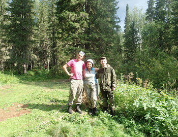 Artyom Palkin, Valentina Palkina, Andrey Milyutin at the "Kaska" ("Helmet") camp site