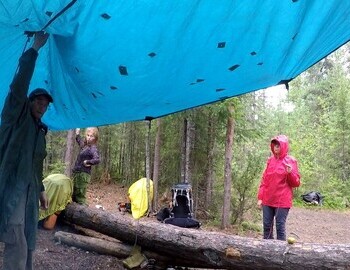 We stopped for lunch at the Shishka (Pine cone) campsite. Rain was coming. Stretched the awning.
