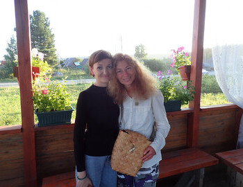 Tatyana Fyodorovna giving me a gift bag made by Mansi