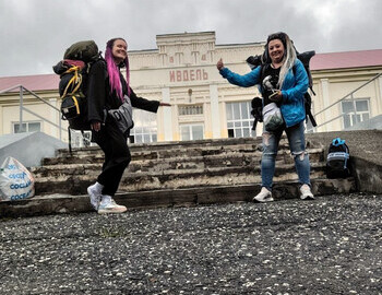 Lena and Ira at the Ivdel train station saying "Goodbye Ivdel"